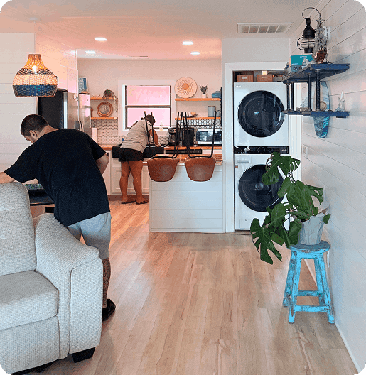 Professional cleaners working in a home